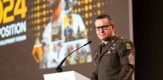 Army Says Soldiers Are Getting New Fitness Uniforms, But Details Are Scant Sgt. Maj. of the Army Michael R. Weimer addresses an audience