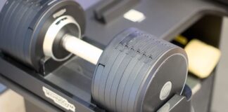 Technogym’s mega-expensive, AI-powered dumbbells might be my pick for the hottest fitness product of the year Technogym adjustable dumbbell in a rack