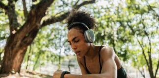 6 Habits to Break Right Now if You Want to Lose Weight Fast woman checking her weight on a manual scale