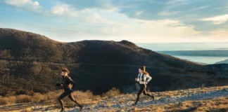 Garmin’s Fitness Segment Revenue Soars in Q3 two people running along a scenic landscape