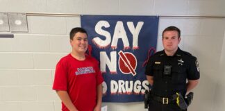 Madison youths: Destigmatizing mental health post-Helene Madison Middle School 8th-grade student Cole Askew and the school's School Resource Officer Josh Burnette stand in front of a "Say No To Drugs" sign Oct. 25, as the school celebrated the 14th annual Red Ribbon Week Oct. 23-31.