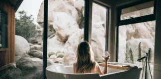 These Are the 3 Hottest Wellness Sectors, Per Report a woman in a tub