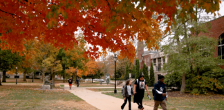 Titan HEART Project Made Possible Through Mental Health Grant students walking on quad with fall foliage