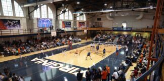Historic Mem Gym Closed for Major Interior Renovations Portrait of the UVA volleyball team practicing.