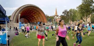 4 tips for finding free and low-cost fitness classes around Boston A Tuesday evening Zumba class at Boston's Hatch Memorial Shell. (Robin Lubbock/WBUR)