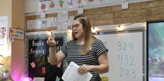 Nutrition education program ending in Ohio after federal SNAP cuts SNAP-Ed Program Assistant Sarah Layton teaches a nutrition less to a classes of elementary school students.