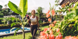 Fitness Trends 2026: Japanese Walking Tops the New Rankings Person with mat on terrace