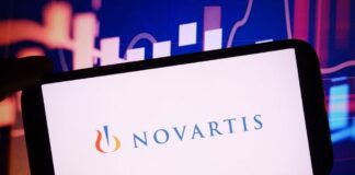 NVS Stock Rises After FDA Grants Breakthrough Therapy Designation For Autoimmune Disorder Treatment In this photo illustration, the Novartis company logo is seen displayed on a smartphone screen. (Photo Illustration by Piotr Swat/SOPA Images/LightRocket via Getty Images)