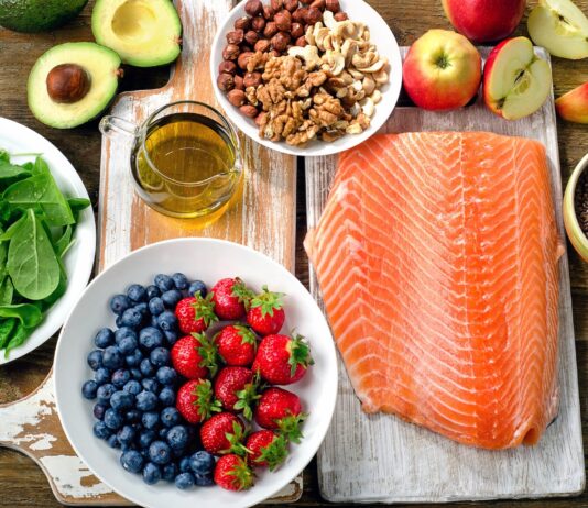New year, new eating habits: Healthy eating options that will last all year Best Foods for healthy Heart on a wooden background. Top view