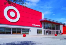 Target Is Adding More Wellness Products as Big Retail Shifts Its Focus Exterior of a Target store with a bright red facade, large bullseye logo and an order pickup entrance under a blue sky.