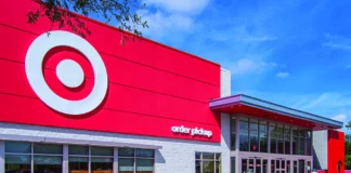 Target Is Adding More Wellness Products as Big Retail Shifts Its Focus Exterior of a Target store with a bright red facade, large bullseye logo and an order pickup entrance under a blue sky.