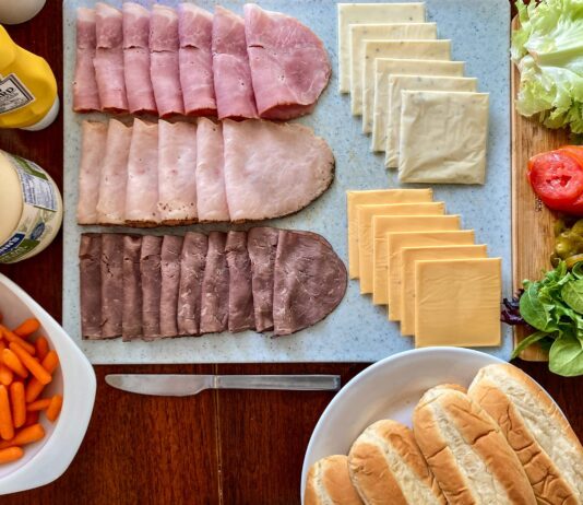 Hormel Execs: High-Protein, On-the-go Snacking Trends Set to Endure a variety of food is laid out on a table