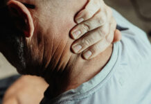 How Chronic Stress Accelerates Aging and Health Decline Man Having a Neck Pain