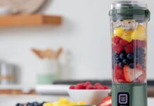 This Small Ninja Blender Makes Healthy Habits Stick Ninja Blast in pale green blending a fresh fruit smoothie