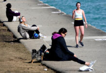 As demand for GLP-1 pills and shots surges, healthy habits are still key FILE - Pedestrians take in the warmer than normal temperatures near the North Avenue Beach Pier along Lake Michigan Feb. 26, 2024, in Chicago. (AP Photo/Charles Rex Arbogast, FIle)