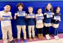 Local students receive toothbrushing kits for Dental Health Month Local students receive toothbrushing kits for Dental Health Month