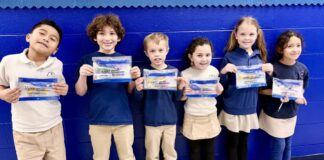 Local students receive toothbrushing kits for Dental Health Month Local students receive toothbrushing kits for Dental Health Month