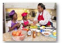 “Little Me, Big Responsibility” initiative promotes early healthy habits for young children – Welcome to San Bernardino County A woman and two girls in a kitchen cooking healthy food.